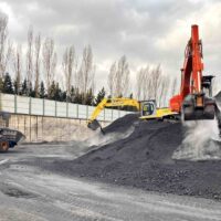 Accumulo con escavatore - Stocking by excavator
